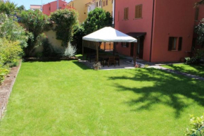 TRILO GREEN CON GIARDINO E POSTO AUTO PRIVATO